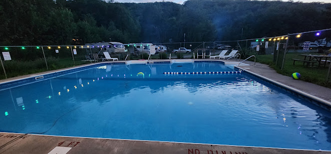 Large outdoor swimming pool at Pioneer Valley RV Campground